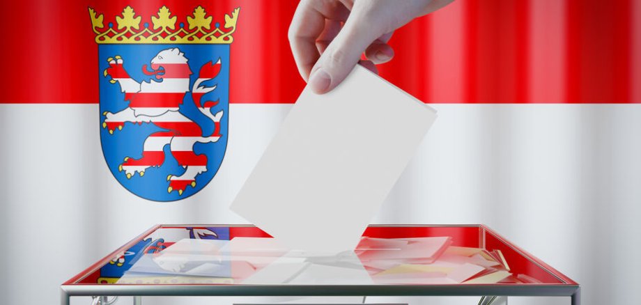 Hesse flag, hand dropping ballot card into a box - voting/ elect Hesse flag, hand dropping ballot card into a box - voting/ elect
